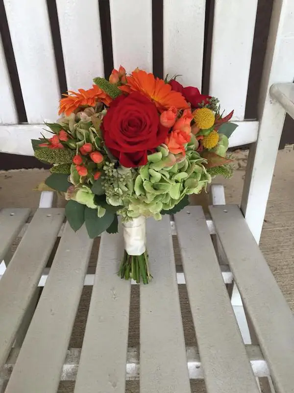 orange fall wedding flowers by kacie cooper floral designer bouquet