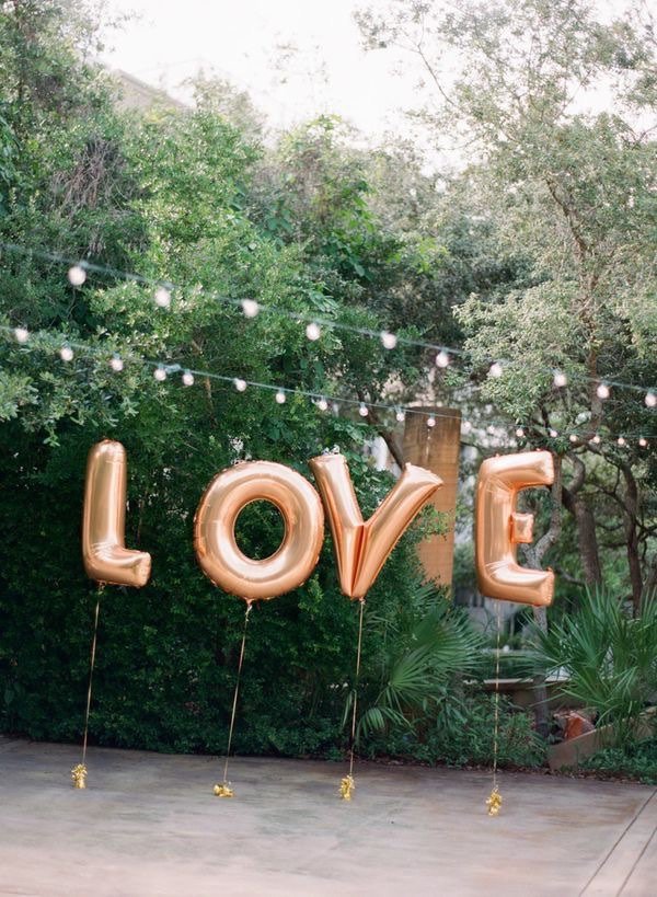 love giant letter balloons for wedding reception decor
