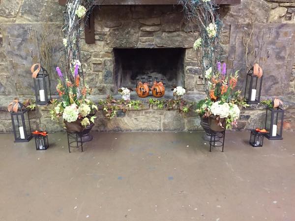 orange fall wedding flowers by kacie cooper floral designer backdrop