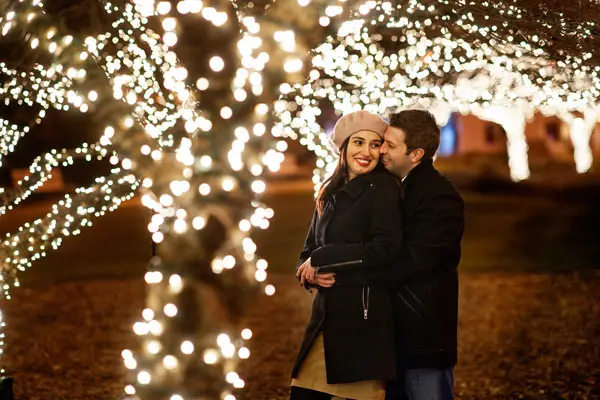 christmas card engagement photos with christmas lights