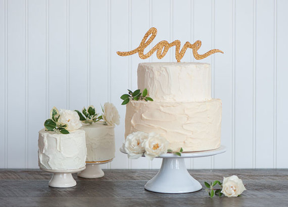 gold love wedding cake topper - gold wedding inspiration