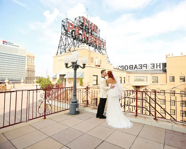 bride and groom on top of the peabody hotel - Cindy B Thymius Photography, midsouthbride.com