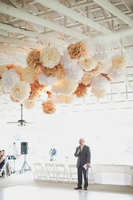 Paper flowers hanging from ceiling store