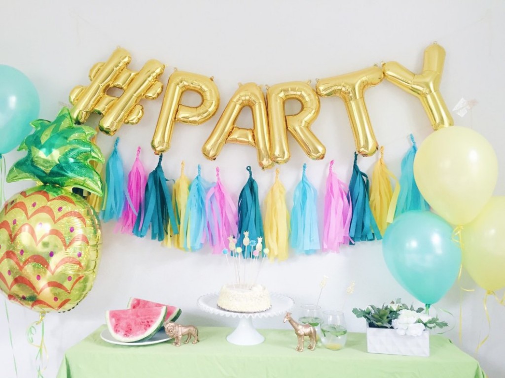 wedding hashtag in giant letter balloons