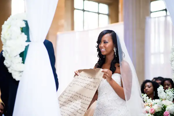 holding up vows photo by SkyTouch_E_Photos - midsouthbride.com 