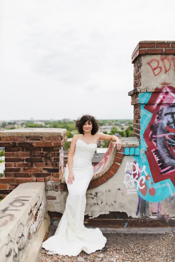 Sarah wearing a white bridal dress from Low's bridal on top of building for Downtown Memphis Photo Session - Elizabeth Hoard Photography 