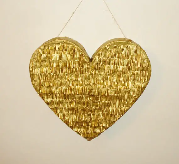 kid friendly wedding ideas - gold heart shaped pinata
