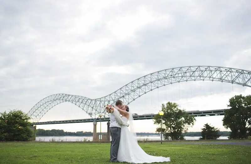 Mud Island Park Memphis Wedding Venue couple in front of the M bridge photo by Kelly Ginn Photography