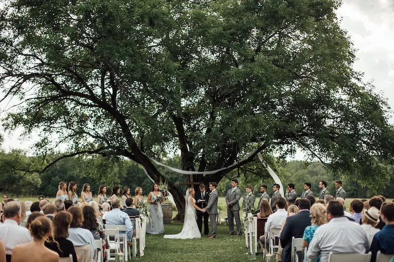wedding ceremony under the tree at Hedge Farm in Red Banks, MS photo by The Warmth Around You