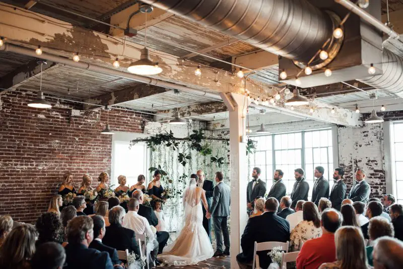 ceremony at Industrial Downtown Wedding Venue 409 South Main photo by The Warmth Around You